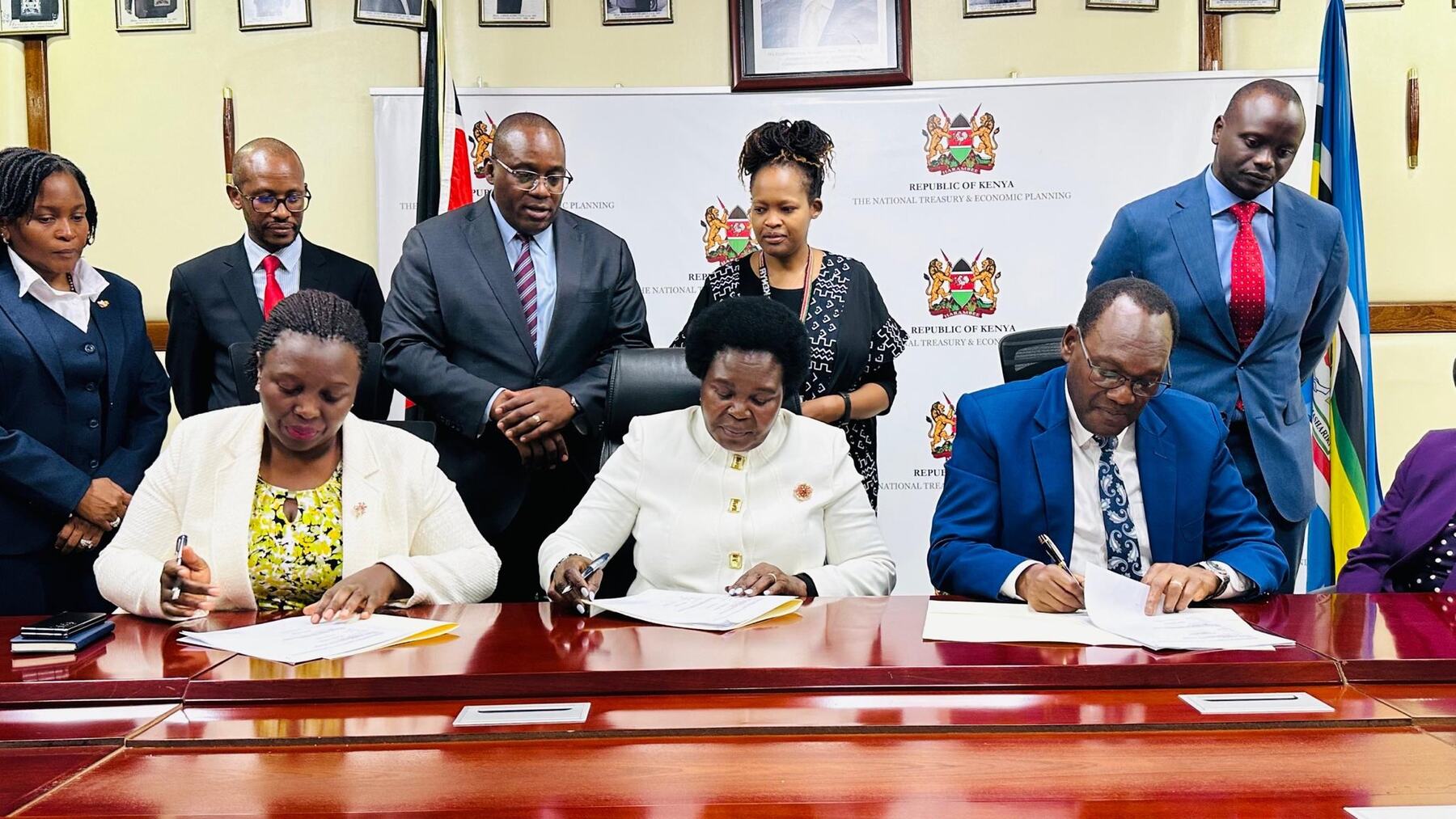 Officials signing KPC IPO regional participation documents