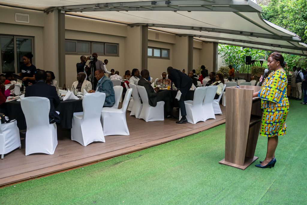 Speaker addressing guests at the Post-KPC IPO stakeholder luncheon